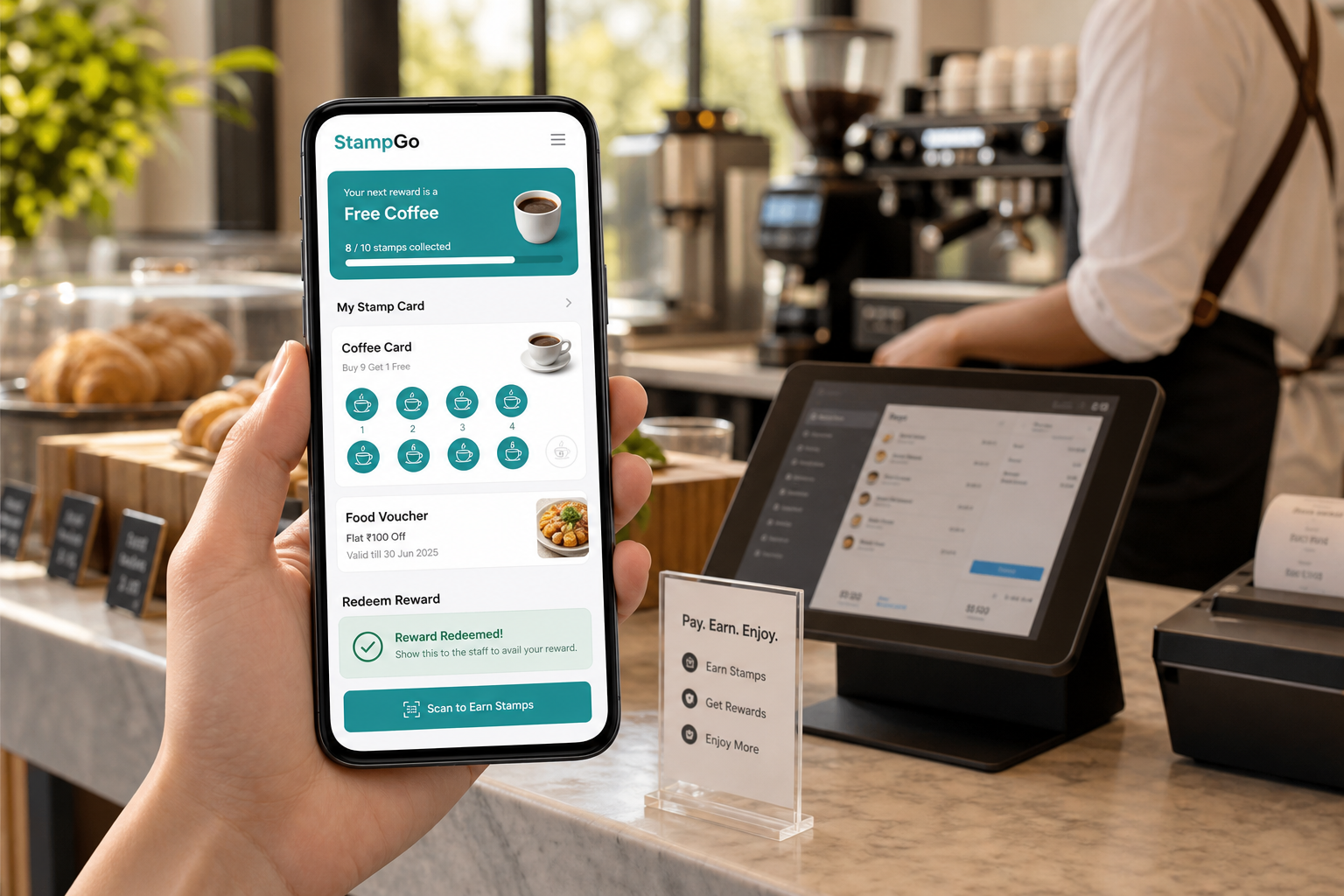 StampGo digital food voucher app displayed on an Android phone in a modern cafe